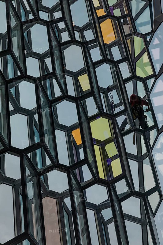 Window cleaners cleaning the glass facade of the Harpa Concert Hall and Congress Centre, interior view, Reykjanes Peninsula, Sudurnes, Iceland, Europe
