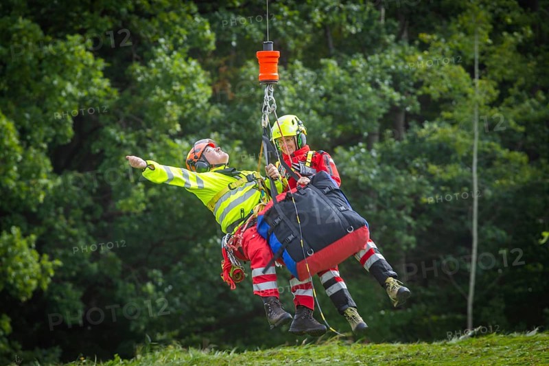 Winch rescue training of the rescue helicopter, Christoph 62, on the occasion of the 50th anniversary of the DRF Luftrettung. The rescue of casualties in the Elbe Sandstone Mountains will be practised