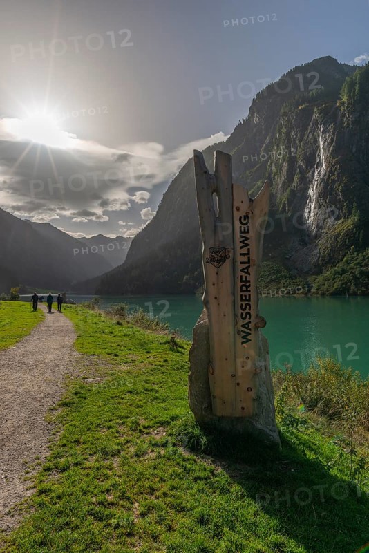 Stilluptal, Stiillup reservoir (1116m), Stillupgrund, Mayrhofen, reservoir lake, alpine mountain landscape, coniferous forest, backlight, waterfall hiking trail, hiker, Zillertal Alps, Tyrol, Austria, Europe