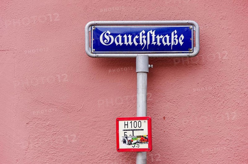 Street sign Gauckstraße, a street sign that reads like Gauckstraße, as if it was named after the 11th President of Germany, Joachim Gauck, but is actually placed in Gauchstraße, in Freiburg, Breisgau, Baden-Württemberg, Germany, Europe