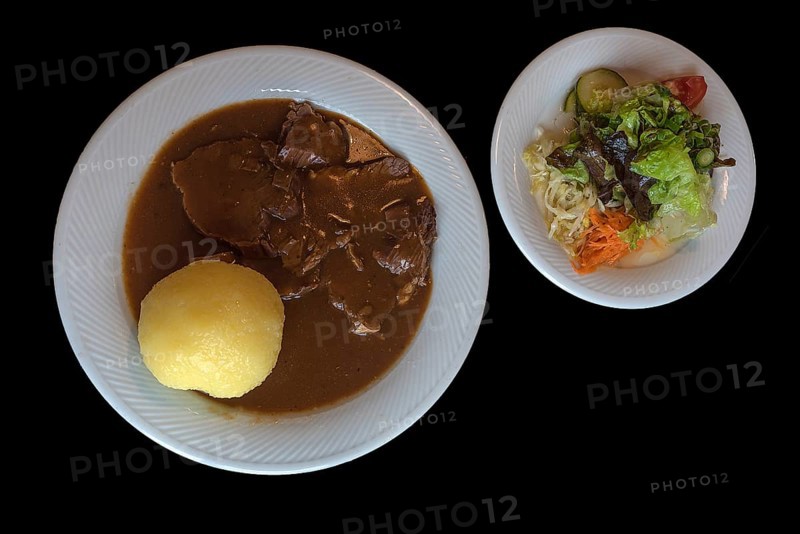 Sauerbraten with dumpling and salad, black ground, Bavaria, Germany, Europe