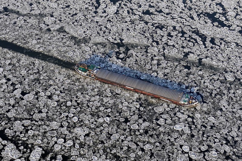 Aerial view of a barge during ice conditions on the Elbe, transport, traffic, weather, climate, Schleswig-Holstein, Lower Saxony, Germany, Europe