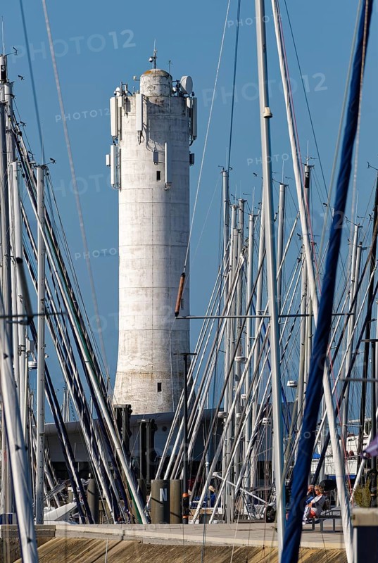Lighthouse at the Port de Crouesty, the port of Arzon, in Brittany. Arzon, Morbihan, Brittany, France, Europe