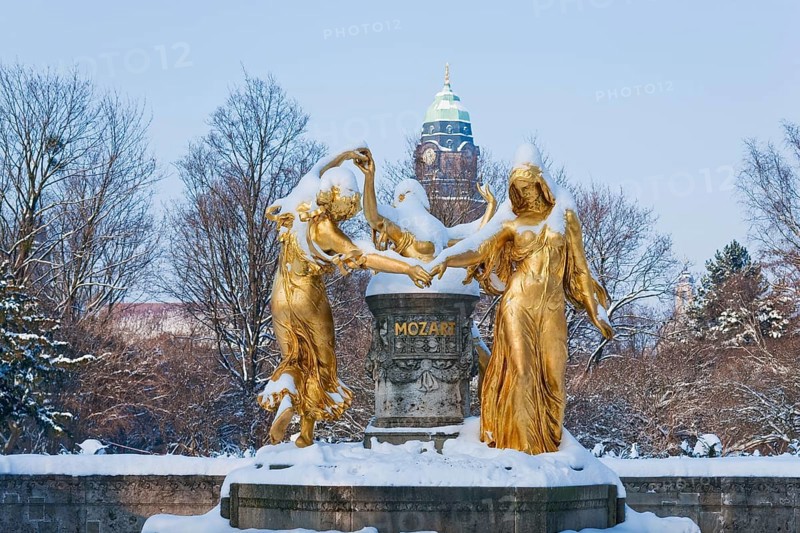 Mozart monument, the sculpture by the Berlin sculptor Hermann Hosaeus, erected in 1907, shows the three female figures dancing around the name Mozart: Heiterkeit, Ernst und Anmut. It was reinstalled in the Bürgerwiese in 1991 after extensive renovation with new gilding