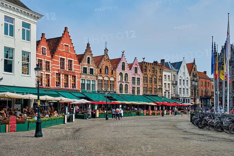 Bruges, Belgium, May 29, 2018: Bruges Grote markt square famous tourist place with many cafe and restaurants, Europe