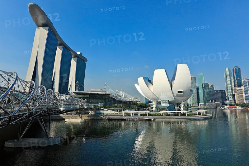 SINGAPORE, MAY 8: The Marina Bay Sands complex and ArtScience Museum on May 8, 2011 in Singapore. Marina Bay Sands is an integrated resort and billed as the world's most expensive standalone casino property