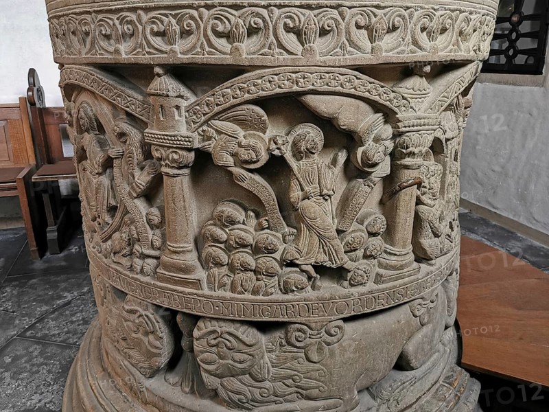Romanesque baptismal font from 1129 in the former collegiate church of St. Boniface, relief Assumption, Freckenhorst, Warendorf district, Baden-Württemberg, Germany, Europe