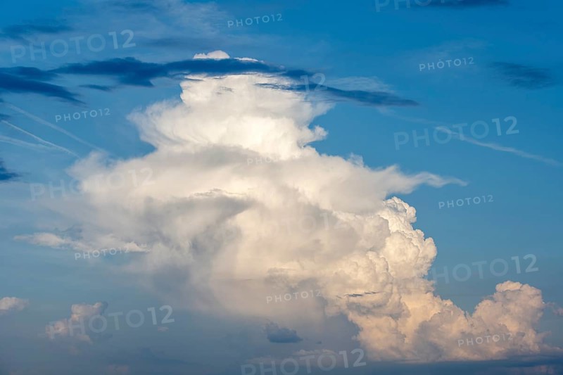 Cumulonimbus, thundercloud against blue sky, Germany, Europe