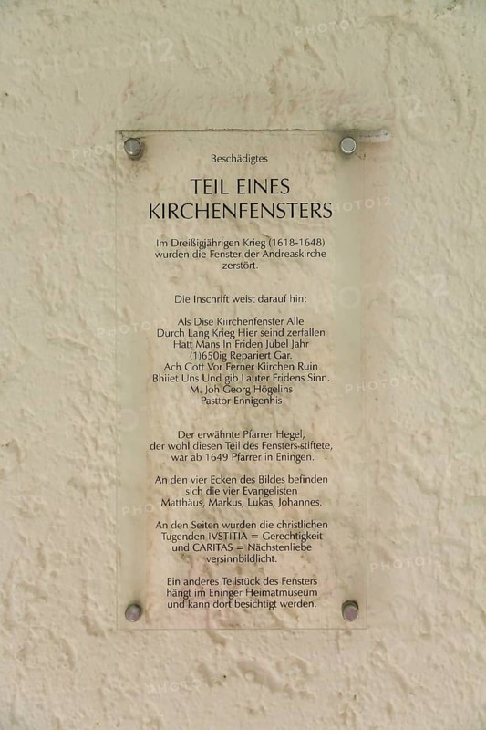Information board, part of a church window, historical and partly destroyed church window, Protestant St. Andrew's Church, writing, letters, Eningen unter Achalm, Baden-Württemberg, Germany, Europe