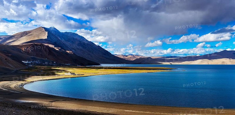 Panorama of Himalayan lake Tso Moriri and Korzok village in Himalayas on sunset, Ladakh, India, Asia