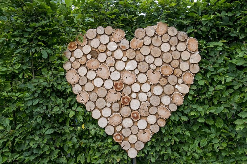 Heart made of small wooden discs, Münsterland, North Rhine-Westphalia, Germany, Europe