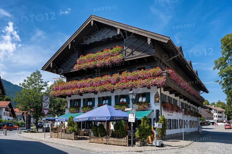 Historic half-timbered house with floral decorations, Oberammergau, Garmisch-Partenkirchen district, Upper Bavaria, Germany, Europe