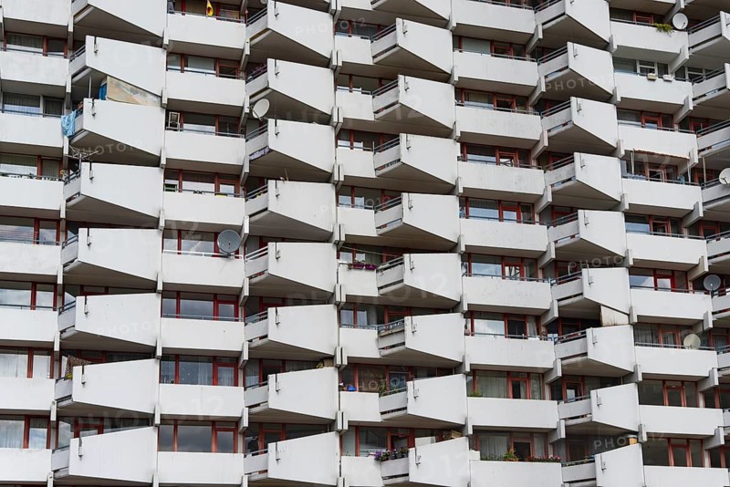 High-rise residential building with balconies and satellite dishes, Trabantenstadt Chorweiler in Cologne, North Rhine-Westphalia, Germany, Europe