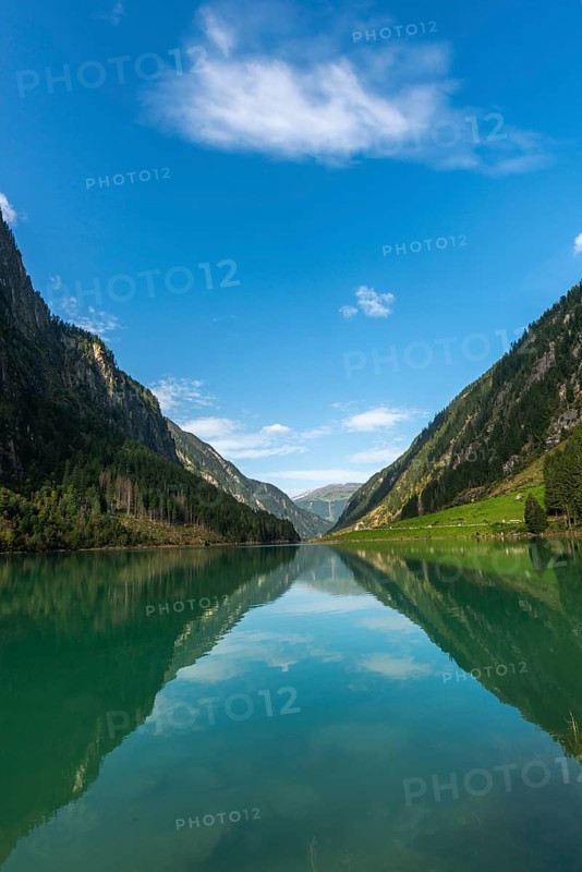 Stilluptal, Stiillup reservoir (1116m), Stillupgrund, Mayrhofen, reservoir lake, alpine mountain landscape, coniferous forest, water reflection, blue sky, symmetry, Zillertal Alps, Tyrol, Austria, Europe