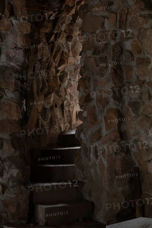 Rye, Colorado, An internal stairway at Bishop Castle. The Castle is an elaborate stone and metal structure and roadside attraction. It is being built by Jim Bishop in the mountains of San Isabel National Forest