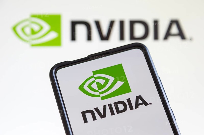 Nvidia logo of the developer of graphics processors on a mobile phone and computer screen