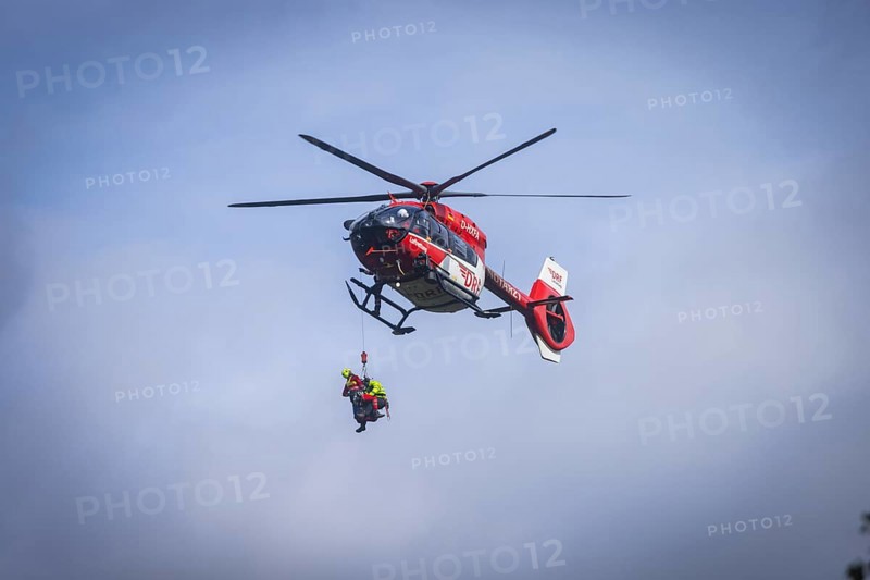 Winch rescue training of the rescue helicopter, Christoph 62, on the occasion of the 50th anniversary of the DRF Luftrettung. The rescue of casualties in the Elbe Sandstone Mountains will be practised