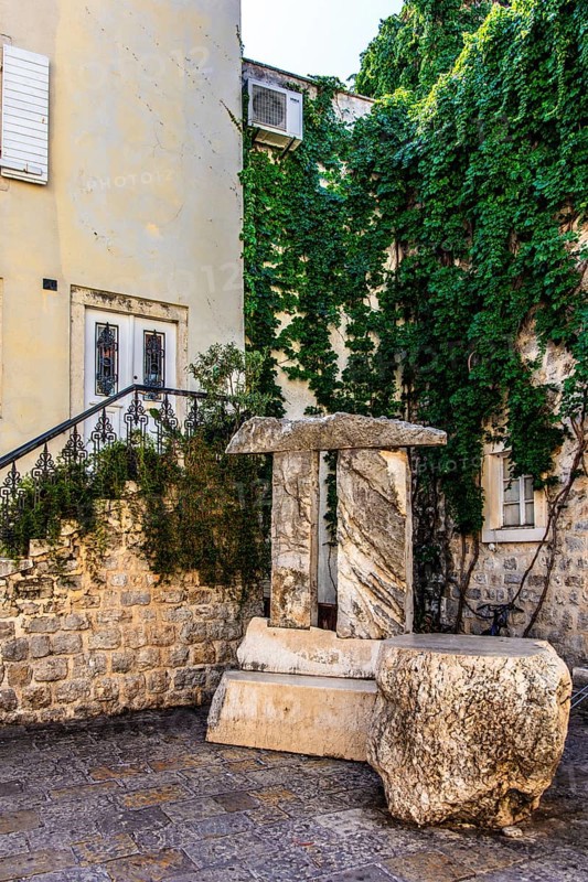 Poets' Square with stone Pi monument, Budva Old Town, Montenegro, Budva, Montenegro, Europe