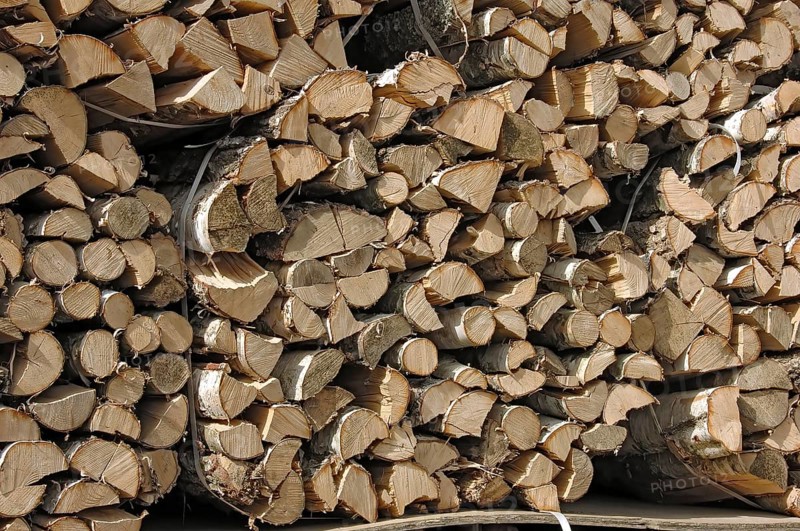 Firewood, split logs, bundled for sale