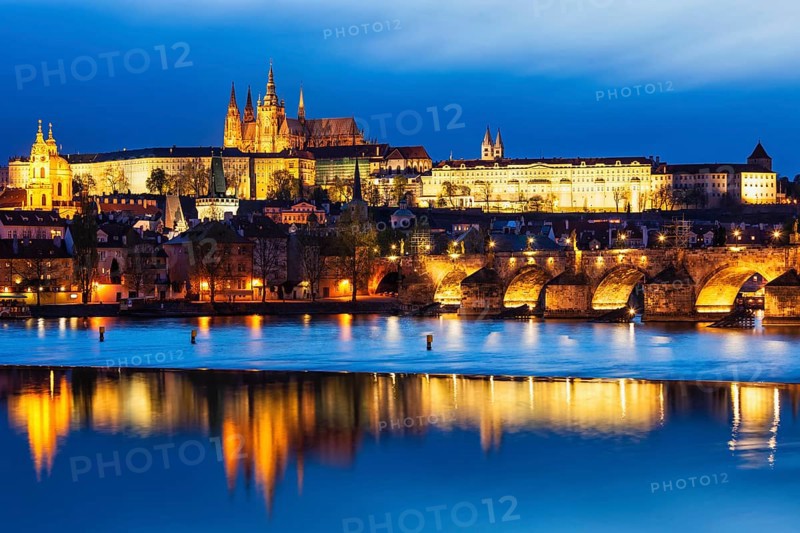 View of Charles Bridge (Karluv most) and Prague Castle in twilight. Prague, Czech Republic, Europe