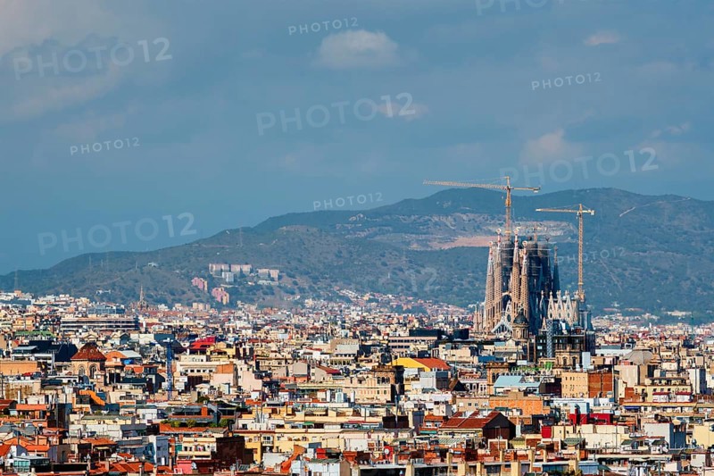 Barcelona, Spain, April 16, 2019: Aerial view of Barcelona city with famous Sagrada Familia basilica under construction, Europe