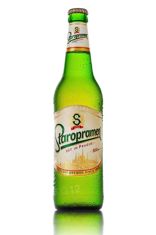 MINSK, BELARUS, OCTOBER 3, 2016: Bottle of Staropramen beer isolated on white background. Staropramen Brewery is the second largest brewery in the Czech Republic