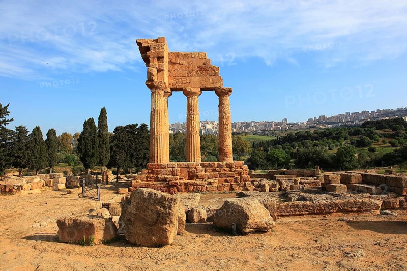 In the Parco Valle dei Templi di Agrigento, Unesco World Heritage Site, remains of the ancient city of Akragas in the Valley of the Temples of Agrigento, remains of the Temple of Dioscuri at Porta V, Sicily, Italy, Europe
