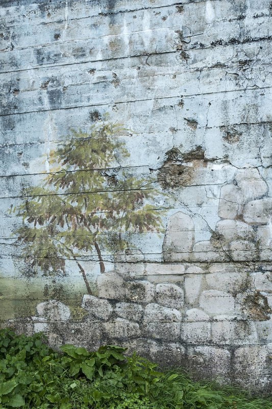 Camouflage painting on rear of gun casemate, artillery bunker of WWII Batterie d'Azeville Battery, part of German Atlantic Wall, Normandy, France, Europe