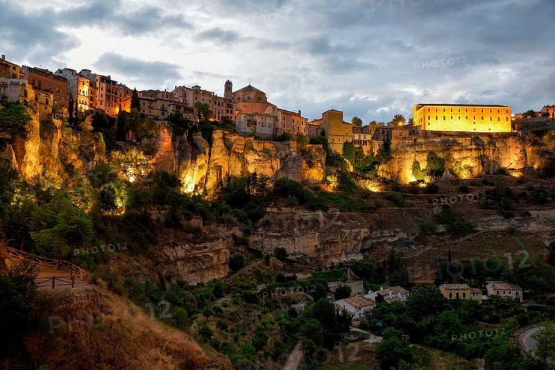 Illuminated Old Town of Cuenca at dusk, Castilla-La Mancha Region, Spain, Europe
