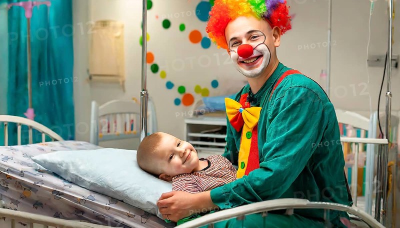 A clown, a clinic clown, in mask, red nose and costume with a sick child in the clinic, AI generated, AI generated