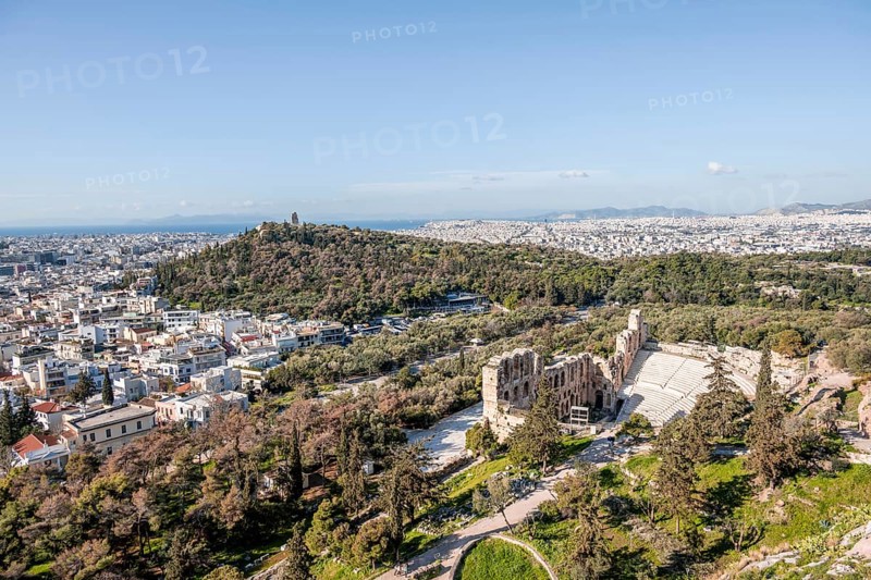 View from the Acropolis of Herod's Theatre and Philopappos Hill, behind sea of houses of the city, Athens, Attica, Greece, Europe