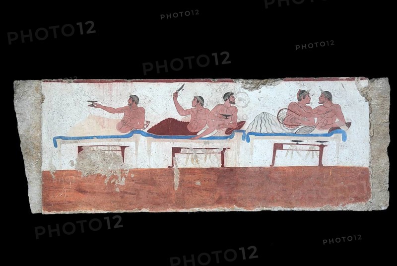 Tomba del Tuffatore, Tomb of the Diver, 480 B. C. Interior painting of the long side with a guest banquet scene with a homosexual pair of lovers and three other people playing the game of Kottabas