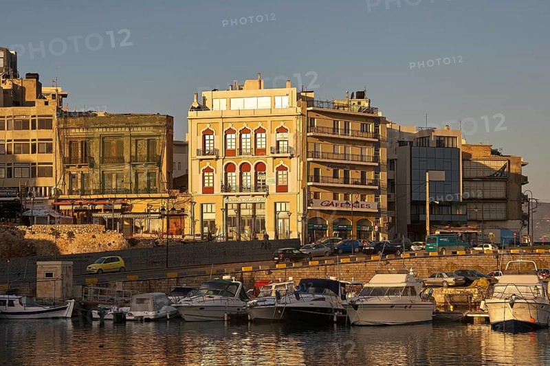 Morning light, boats, houses, harbour, blue sky, Heraklion, capital, island of Crete, Greece, Europe