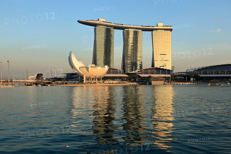SINGAPORE, MAY 6: The Marina Bay Sands complex on sunset on May 6, 2011 in Singapore. Marina Bay Sands is an integrated resort and billed as the world's most expensive standalone casino property