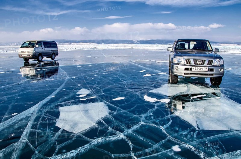 Cars on ice, Lake Baikal, Olkhon Island, Pribaikalsky National Park, Irkutsk Province, Siberia, Russia, Europe