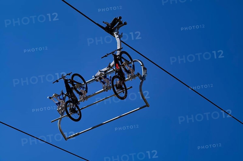 T-bar lift, chairlift, with special holder for a mountain bike, Sella Pass, Selva di Val Gardena, Val Gardena, South Tyrol, Italy, Europe