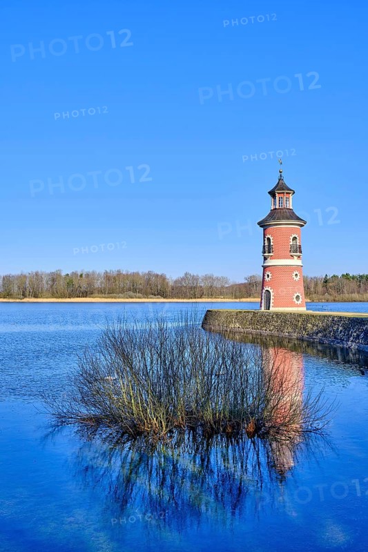 The Moritzburg lighthouse on the Moritzburg pond was erected in the 18th century under Elector Friedrich August III as a staffage building for re-enacted naval battles and is a popular destination for excursions today, Moritzburg near Dresden, Saxony, Germany, Europe