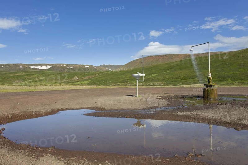 Shower and sink with hot water at Krafla, volcanic caldera in the Myvatn Geothermal Area in summer, North Iceland