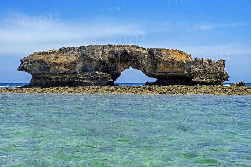 Natural rock arch in the Mozambique Channel in front of the fishing village Andavadoaka near Morombe, Atsimo-Andrefana Region, Madagascar, Africa