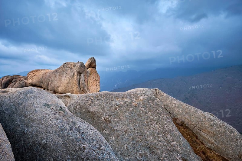 View of stone and rock formations from Ulsanbawi rock peak in stormy weather. Seoraksan National Park, South Corea