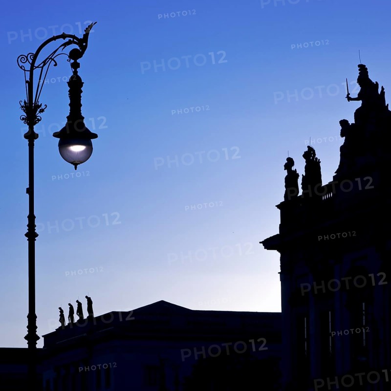 Old Berlin gas lanterns in the street Unter den Linden in the blue hour at the German Historical Museum, Berlin, Germany, Europe
