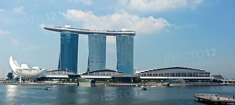 SINGAPORE, MAY 6: The Marina Bay Sands complex on May 6, 2011 in Singapore. Marina Bay Sands is an integrated resort and billed as the world's most expensive standalone casino property. Panorama image