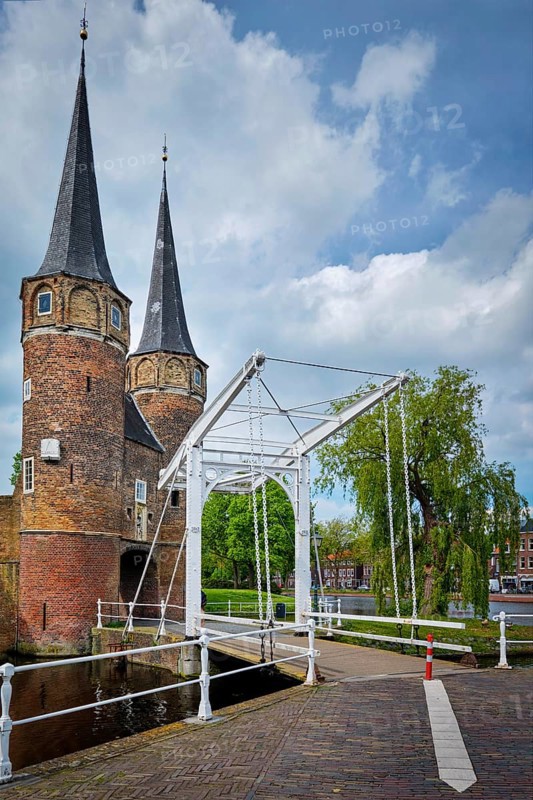 Oostport (Eastern Gate) of Delft illuminated at night. Delft, Netherlands