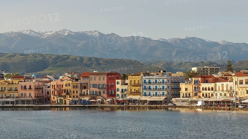 Lefka Ori, White Mountains, Snowy Mountains, Venetian Old Town, Venetian Port, Row of Houses, Colourful Houses, Calm Sea, Blue Sea, Grey Blue Sea, Blue Cloudless Sky, Chania, West Crete, Island of Crete, Greece, Europe