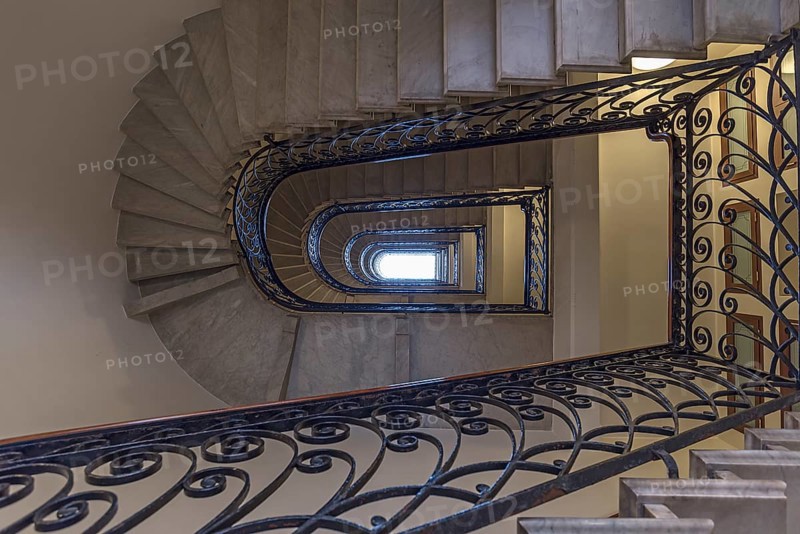Staircase around 1900 with a wrought-iron banister, in a residential building, Genoa, Italy, Europe