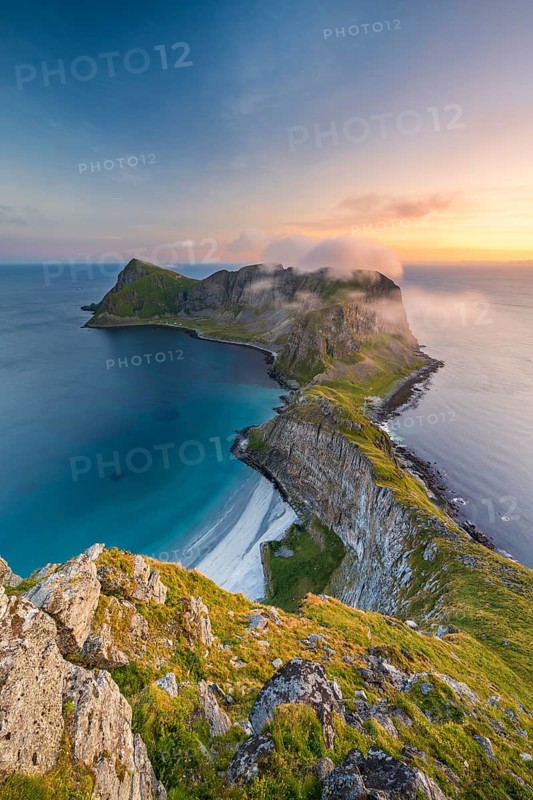 View from Håheia or Håen mountain to mountains and coast, evening mood, Måstad peninsula, Værøy island, Vaeroy, Lofoten, Norway, Europe