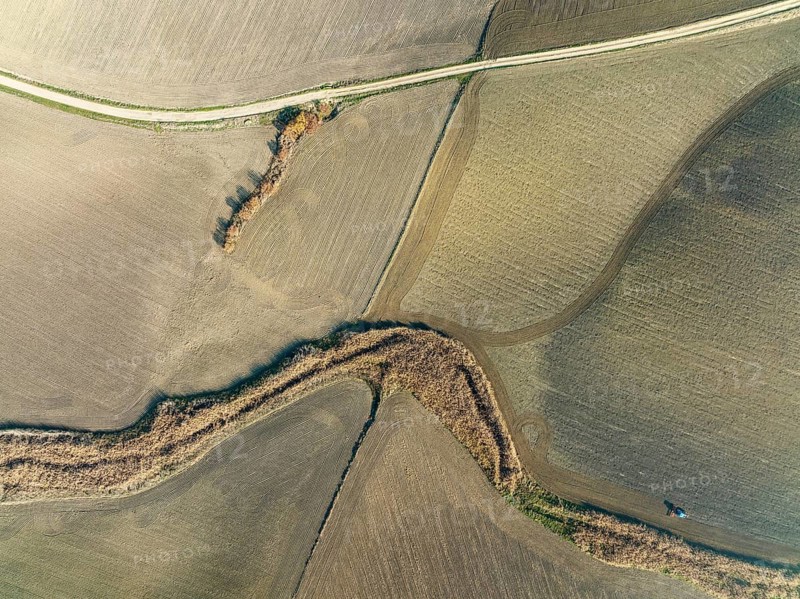 Cultivated fields in winter in the Campiña Cordobesa, the fertile rural area south of the town of Córdoba, aerial view, drone shot, Córdoba province, Andalusia, Spain, Europe