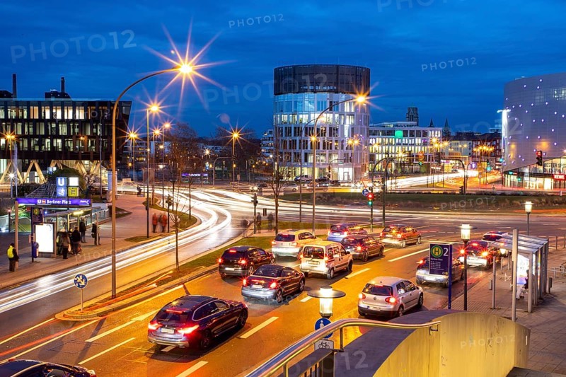 Evening city traffic in Essen, Germany, large intersection, roundabout, Berliner Platz, Berlin Square, this area would also be affected by a diesel driving ban, Essen, North Rhine-Westphalia, Germany, Europe