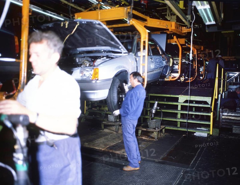 DEU, Germany: The historical slides from the 84-85 r years, Rüsselsheim. Opel plant. Production on assembly lines and shift change ca 1984