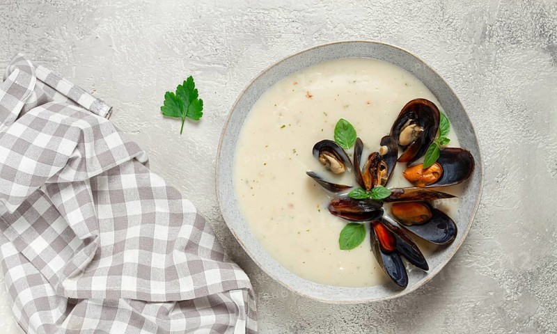 Chowder cream soup with mussels, American cuisine, homemade, no people